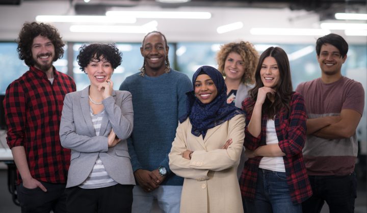 Group of diverse employees smiling for the camera